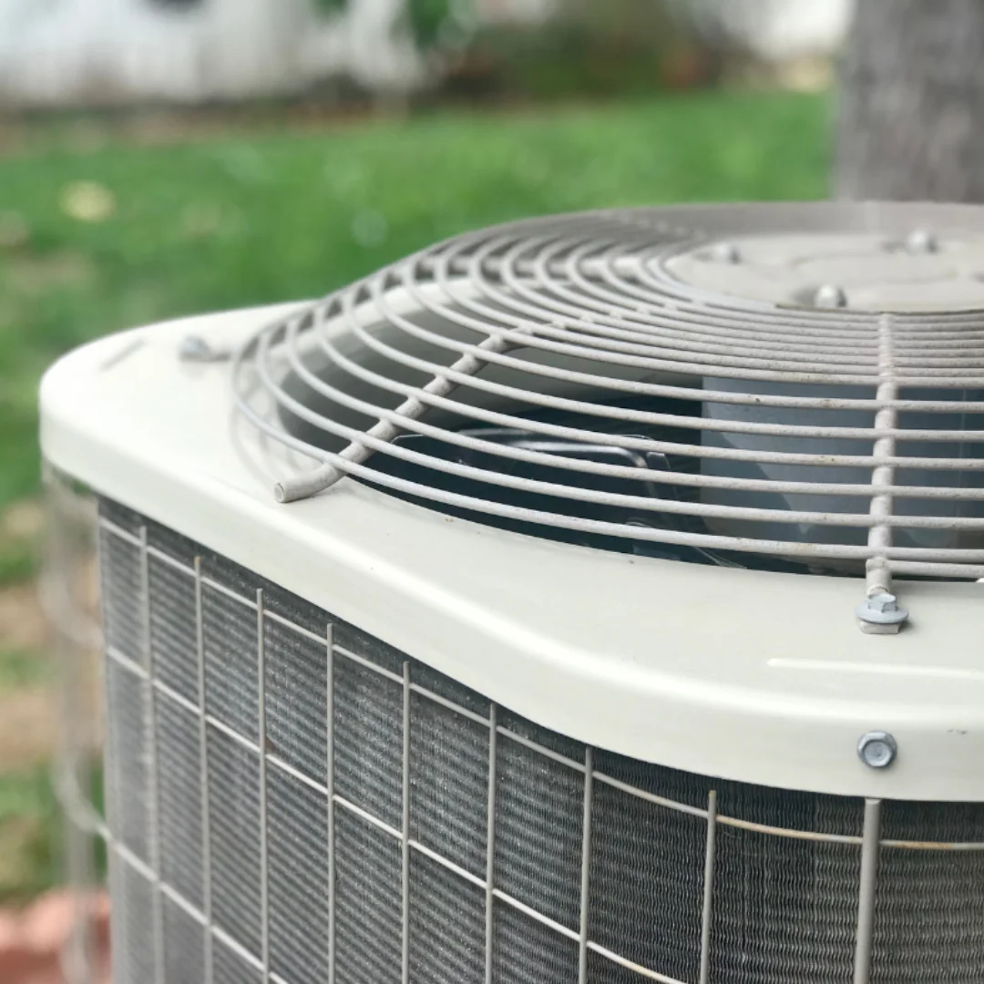 Outdoor residential AC condenser unit close-up